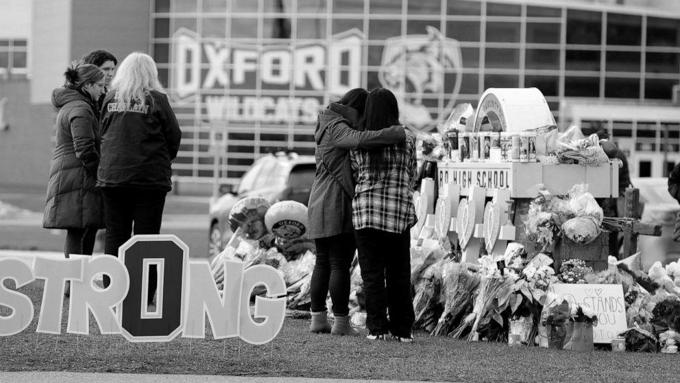 Victims, mother and father of Oxford school taking pictures victims sue college employees